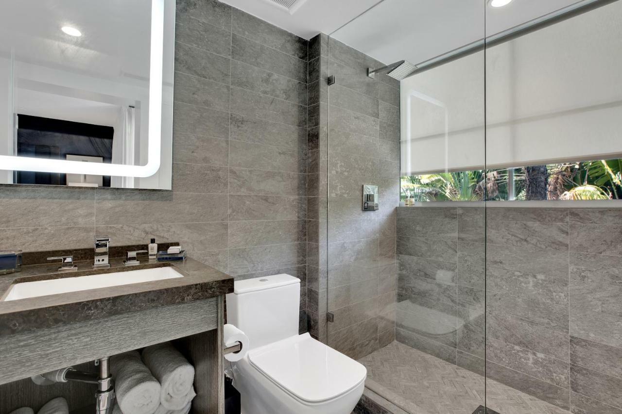 ADA Deluxe Garden View King Balcony with Roll in Shower